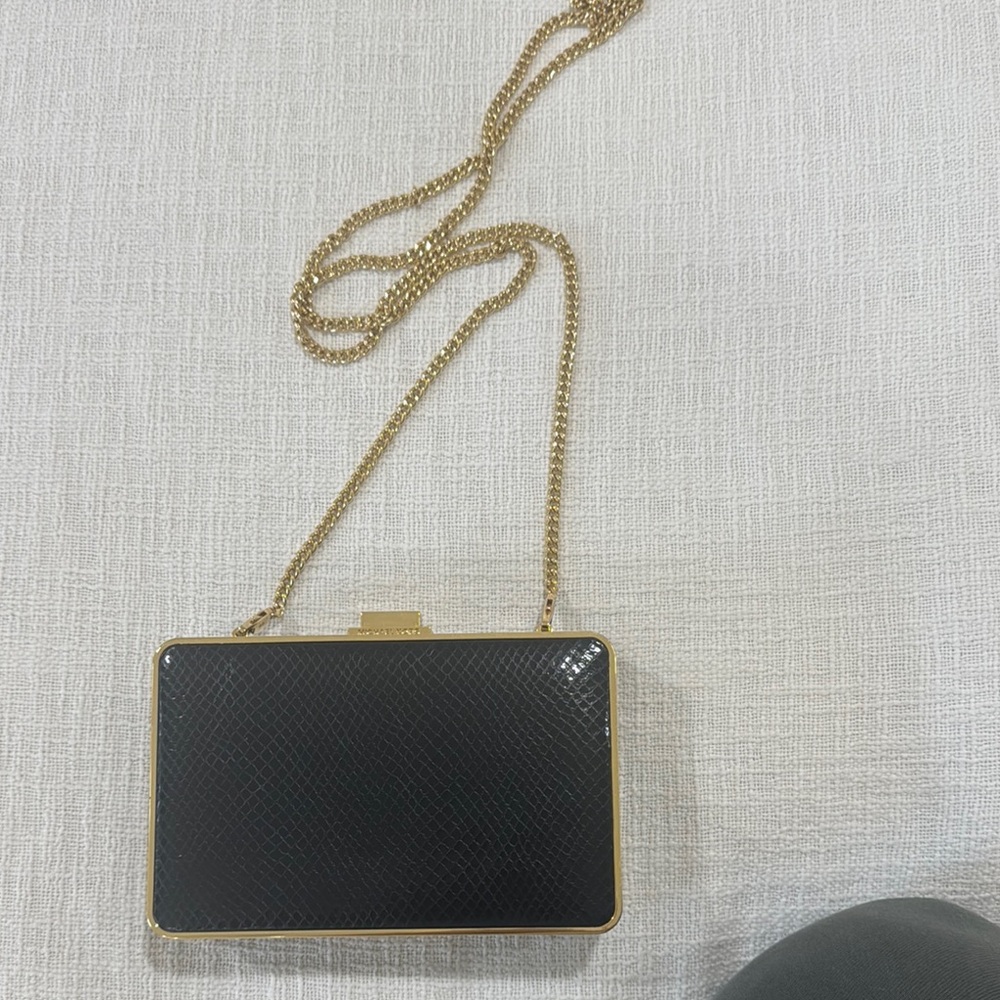 Elegant Black and Gold Clutch Bag